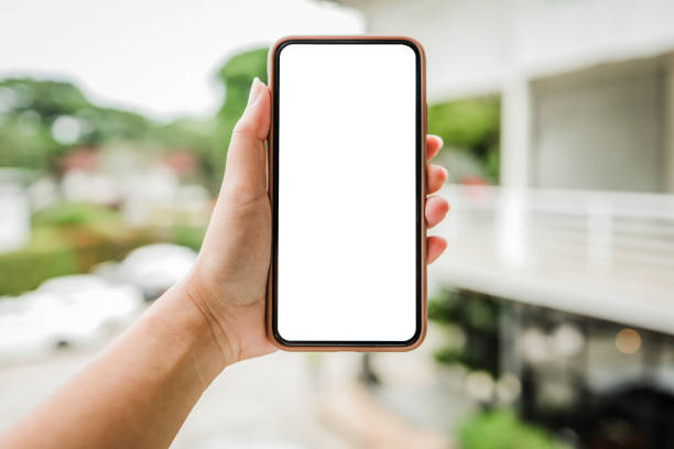 istock Women's hands holding cell telephone blank copy space screen. smart phone with technology concept 1310691684