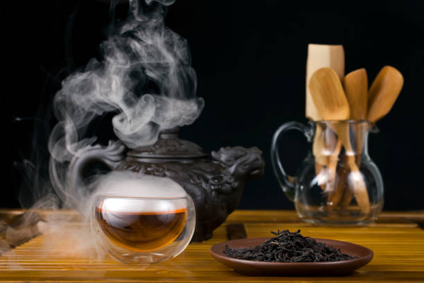 istock Clay teapot with smoked red tea Lapsang souchong 1310701363