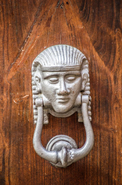 istock sphinx, artistic knocker of the ancient door 1310702062