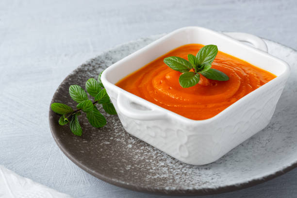 istock Fresh homemade pumpkin puree in a white plate 1310702143