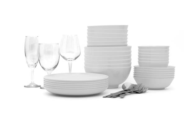 istock set clean dishes glasses on white background 1310705353