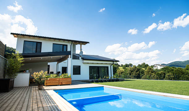 House with swimming pool outdoors in backyard garden. House with swimming pool outdoors in backyard garden in the countryside. back yard stock pictures, royalty-free photos & images