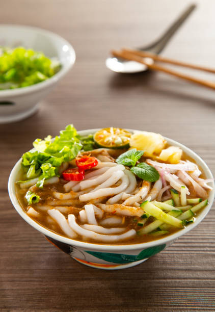 istock Assam Laksa (Noddle in Tangy Fish Gravy) is a Special Malaysian Popular Food 1310708404