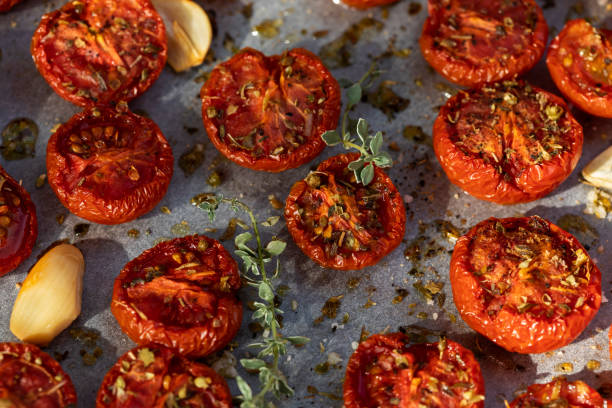 istock Homemade oven dried cherry tomatoes on a tray 1310714493