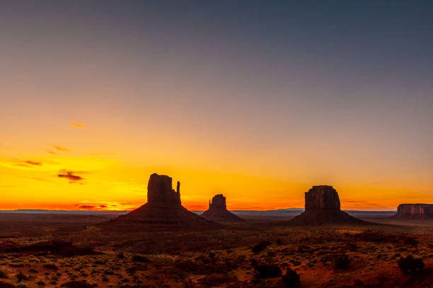 istock Monument Valley silhouette at the beautiful August sunrise, Utah