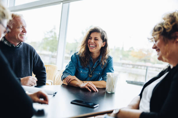 istock Business people smiling during a meeting 1310715478