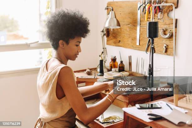 Woman Making Handmade Jewelry In Her Workshop Stock Photo - Download Image Now - Jewelry, Craftsperson, Making