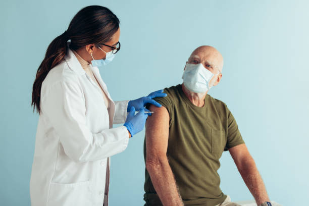 istock Senior man getting covid immunity vaccine 1310716342