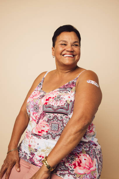 istock Woman smiling after inoculation 1310716415