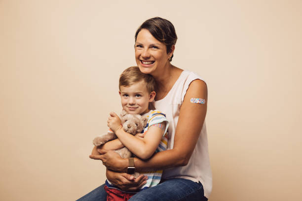 istock Happy mother and son after vaccination 1310716443