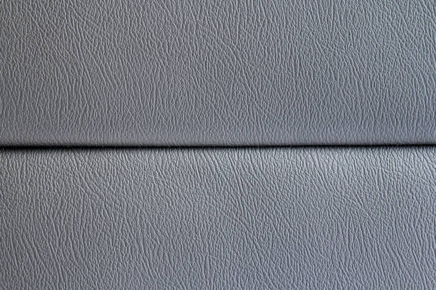 texture en cuir gris du siège d’auto peut être utilisé comme fond - car leather hide seat photos et images de collection