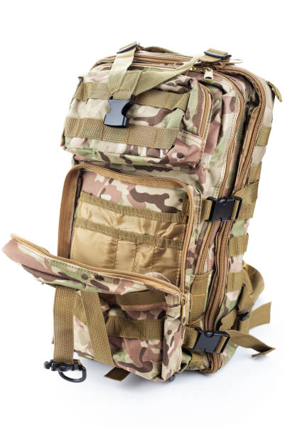 istock Open military backpack of khaki color on a white background. 1310723270