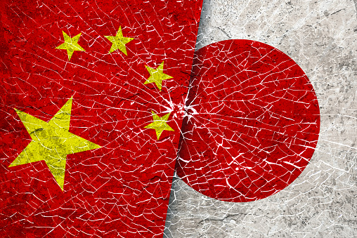 China and Japan Diplomatic Dispute, Trade War, Finance and Economic Sanction Concepts.