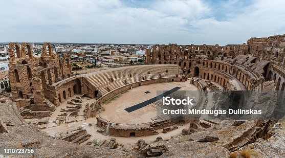 istock Amphitheatre of El Jem in Tunisia. Amphitheatre is in the modern-day city of El Djem, Tunisia, formerly Thysdrus in the Roman province of Africa 1310723756
