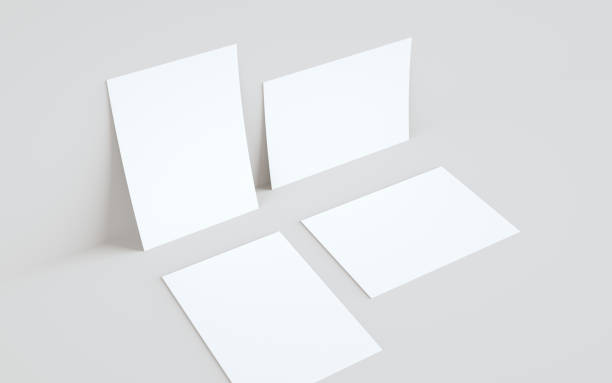 istock A5 Flyer / Brochure Mock-Up - Two Flyers Against Wall Background 1310725941
