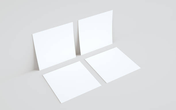 istock Square Flyer Mock-Up - Two Flyers Against Wall Background 1310725961
