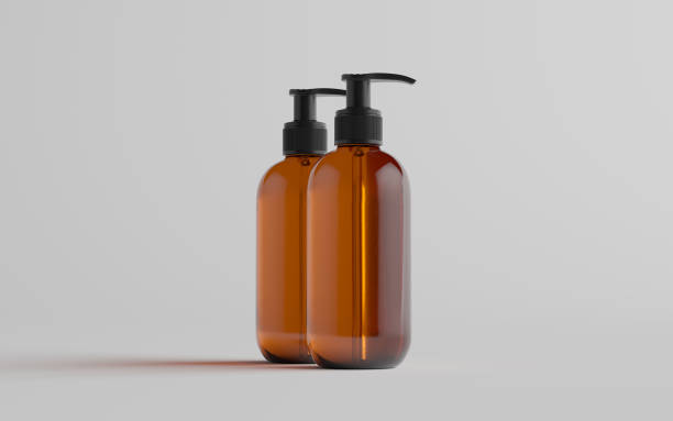 istock Amber Glass Pump Bottle Mock-Up - Liquid Soap, Shampoo Dispenser - Two Bottles 1310725986