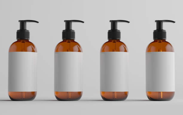 istock Amber Glass Pump Bottle Mock-Up - Liquid Soap, Shampoo Dispenser - Multiple Bottles. Blank Label 1310725997