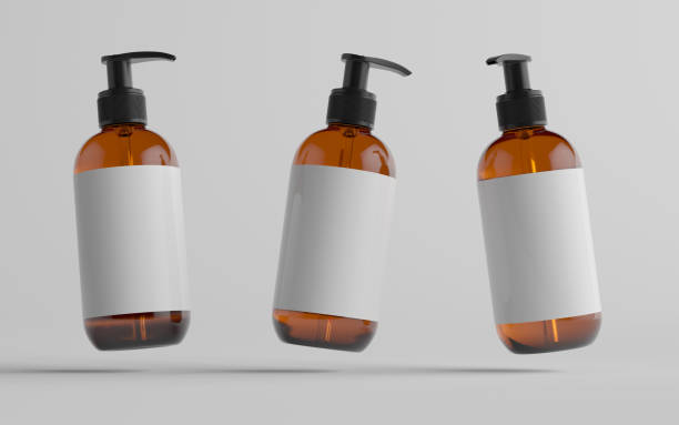 istock Amber Glass Pump Bottle Mock-Up - Liquid Soap, Shampoo Dispenser - Three Bottles. Blank Label 1310726003