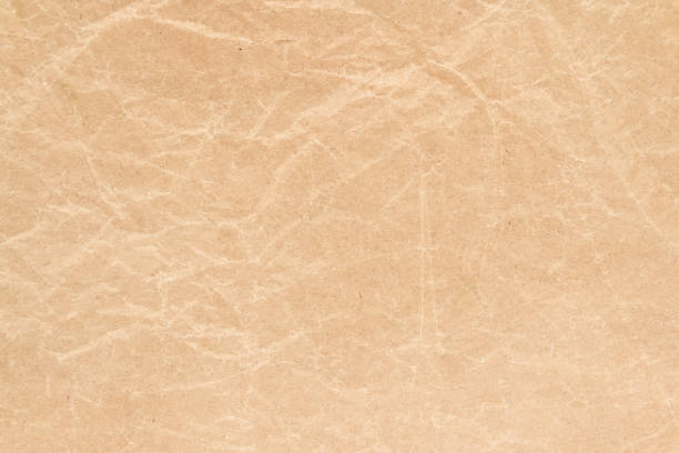 istock Brown wrinkle recycle paper background 1310727188