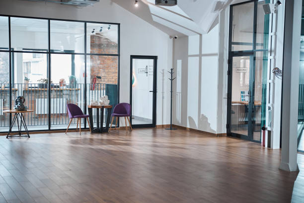 istock Modern empty office room with wooden floor 1310727299