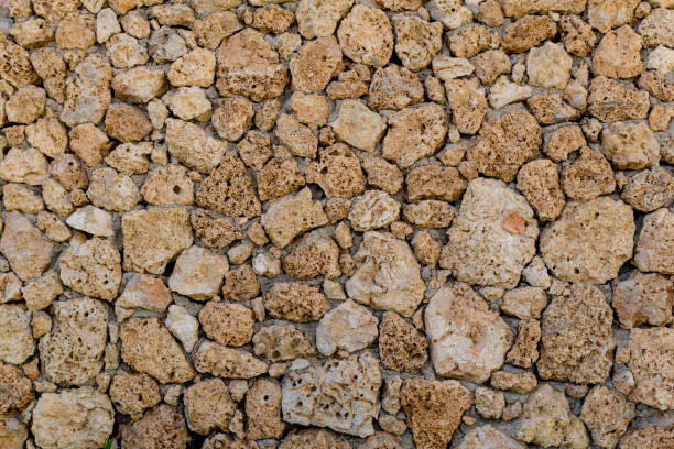 istock Beautiful overlay texture of old stone wall 1310730695