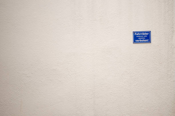 istock Plastered wall with prohibition sign 1310734777