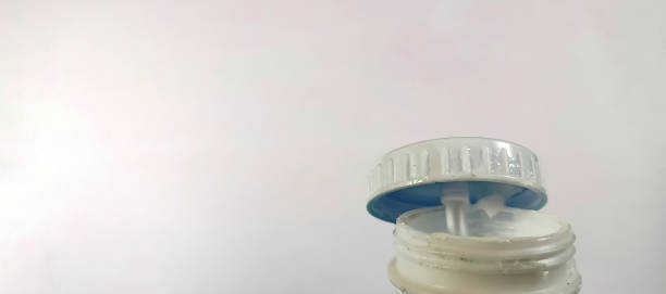 istock Dark white glue from glue can 1310736979