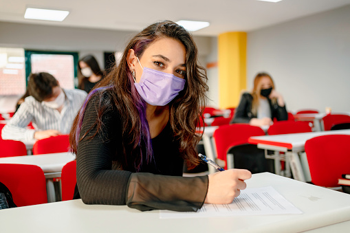 university Students In Classroom Wearing Protective Face Mask