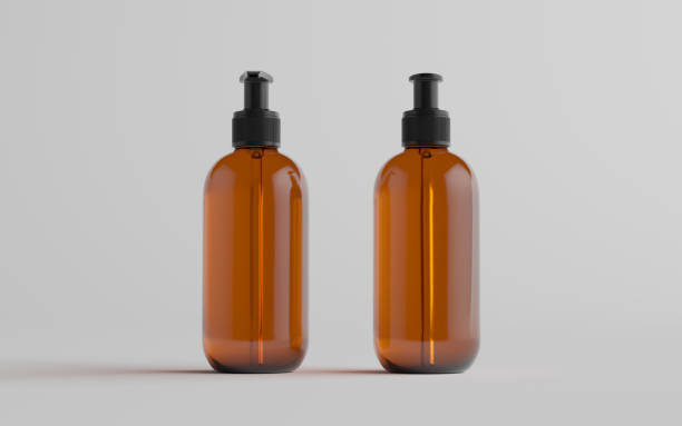 istock Amber Glass Pump Bottle Mock-Up - Liquid Soap, Shampoo Dispenser - Front & Back 1310739594