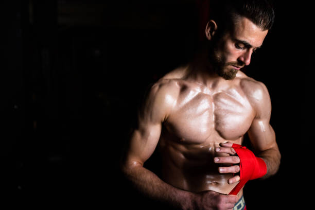 istock Boxing hand wrap in the dark 1310740527