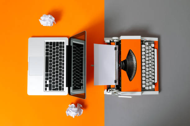 Digital and analog – Laptop and 70s Typewriter