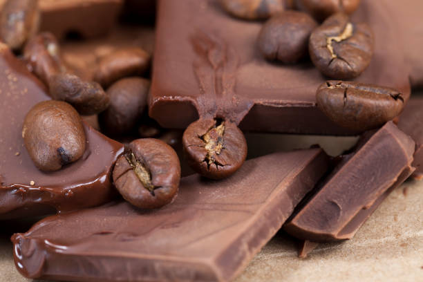 istock chocolate bar with cocoa powder topping and coffee beans 1310743535