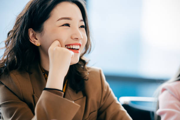 Portrait of Asian businesswoman in office. China - East Asia, Korea, Japan, 30-39 Years, Businesswomen, Suit japanese woman stock pictures, royalty-free photos & images