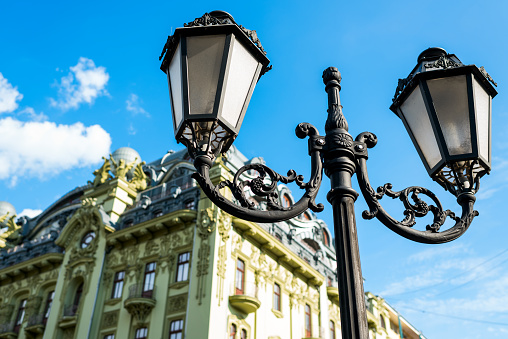 Street lampposts on the background of the building