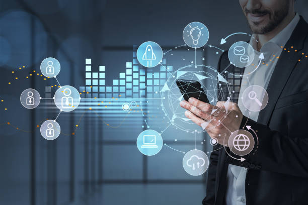 istock Businessman in suit with phone, data symbols and network circuit 1310747242
