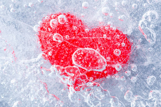 istock Bright red heart covered in ice 1310747319