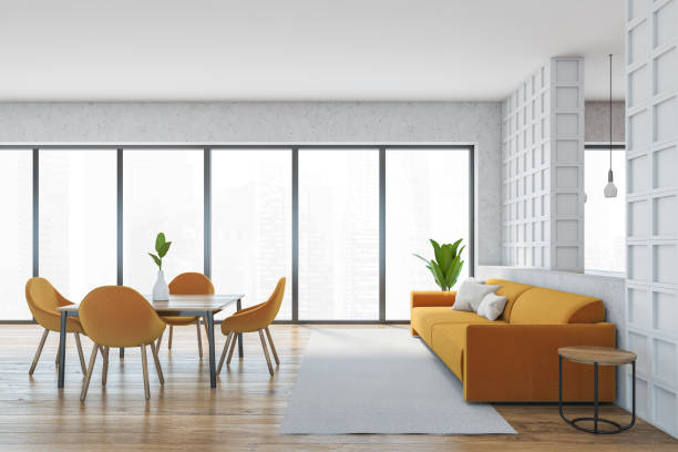 istock Living room with sofa and table with chairs 1310748128