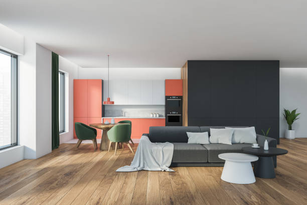 istock Living room interior with sofa and kitchen set with windows 1310748285