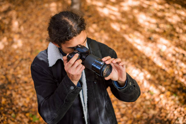 istock Photographer in the Park 1310748450