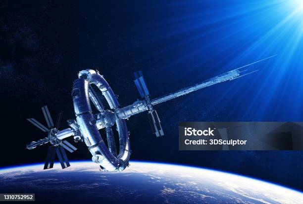 Futuristic Space Station In The Rays Of Blue Light Stock Photo - Download Image Now - Satellite, New, Futuristic