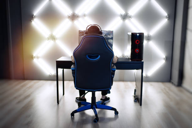 istock Gamer having live stream playing online video game 1310754438