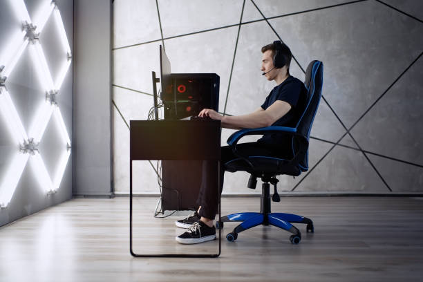 istock Gamer having live stream playing online video game 1310754482