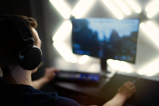 istock Gamer having live stream playing online video game 1310754591