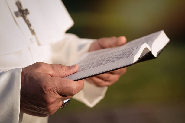 istock Pope reads the Bible 1310754771