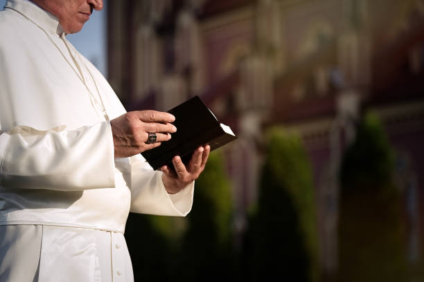 istock Pope reads the Bible 1310754816