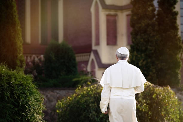 istock Pope walks in the garden 1310754836
