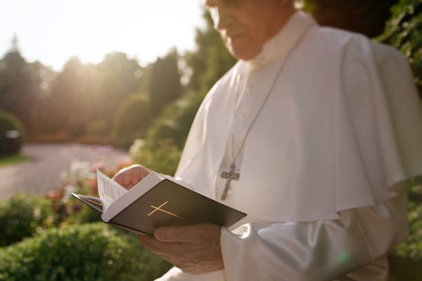 istock Pope reads the Bible 1310754845