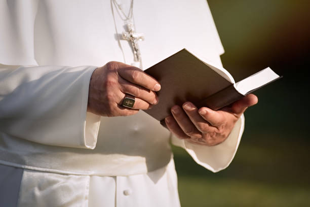 istock Pope reads the Bible 1310754853
