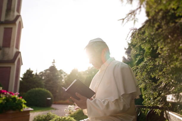 istock Pope reads the Bible 1310754867